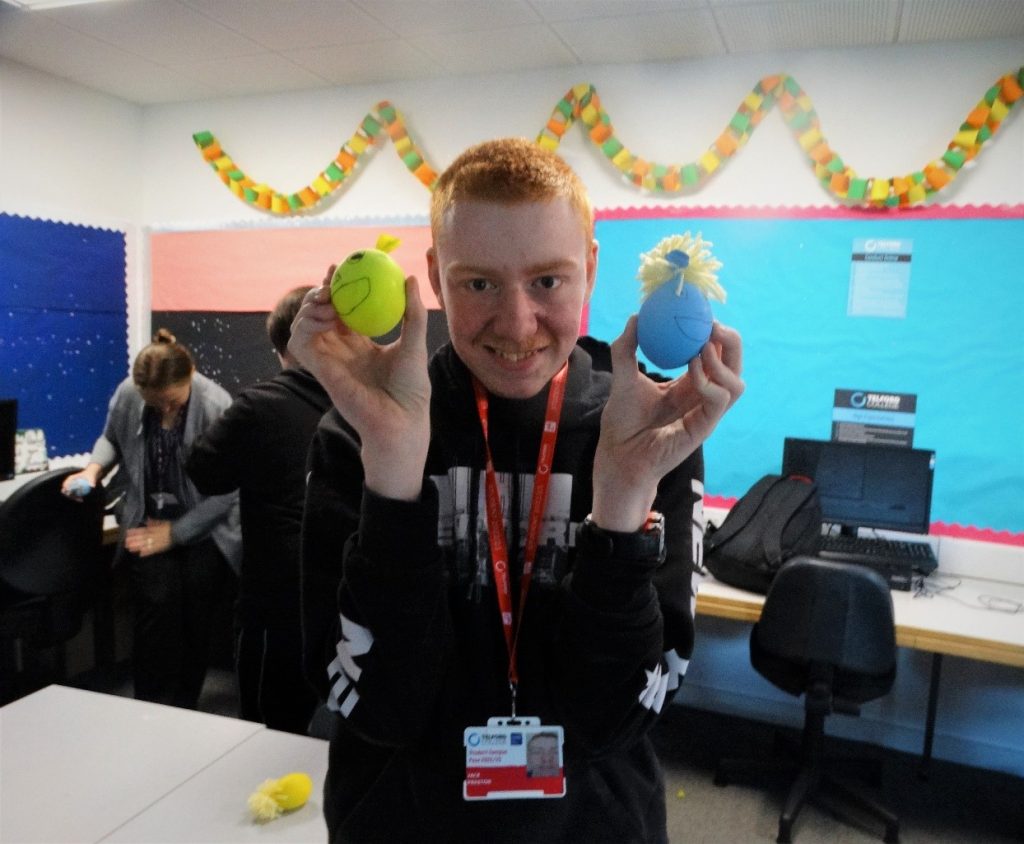 Student Jack Preston with the stress balls he made in the arts and crafts workshop